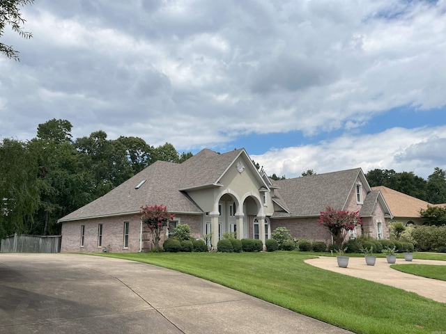 view of front of home with a front yard