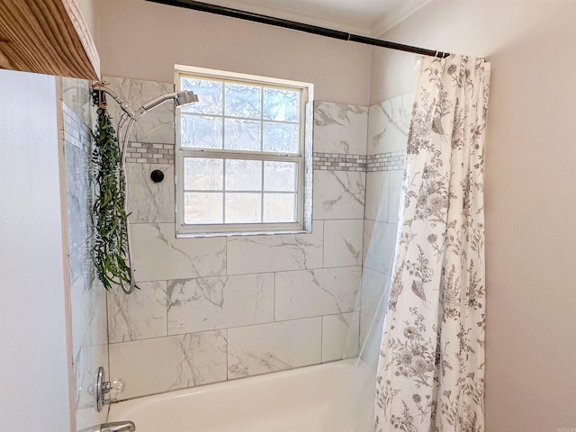 bathroom with shower / bathtub combination with curtain and ornamental molding