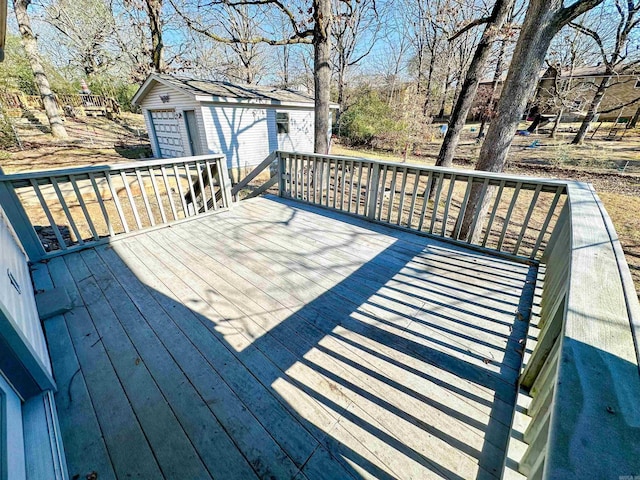 wooden deck featuring a storage shed