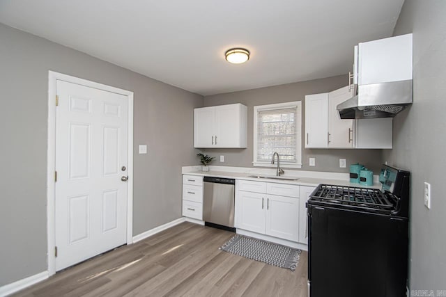 kitchen featuring dishwasher, white cabinets, sink, black range with electric cooktop, and wood-type flooring