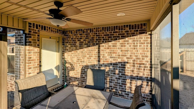 view of patio / terrace featuring ceiling fan