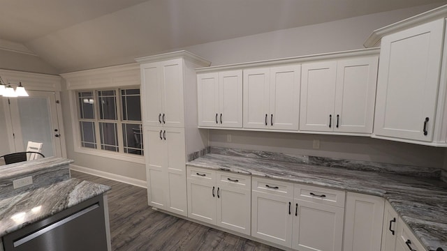 kitchen with stone counters, lofted ceiling, dark hardwood / wood-style flooring, and white cabinets