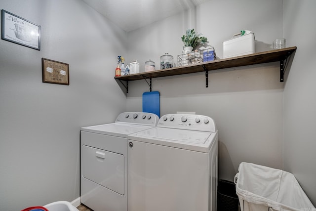 laundry room with washer and dryer