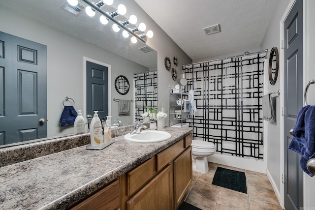 full bathroom featuring vanity, shower / bath combo, toilet, and a textured ceiling