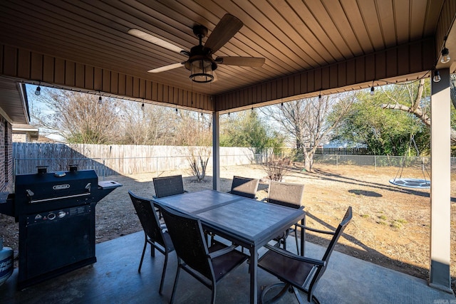 view of patio featuring grilling area and ceiling fan