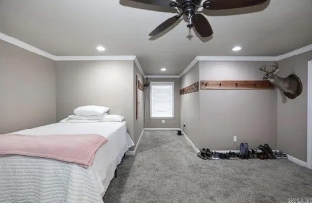 bedroom with ceiling fan, light colored carpet, and ornamental molding