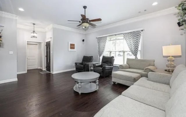 living room featuring ceiling fan, crown molding, and dark wood-type flooring