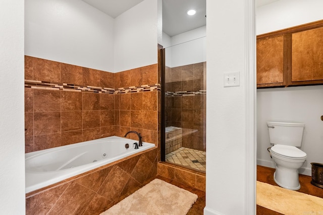 bathroom with separate shower and tub and toilet