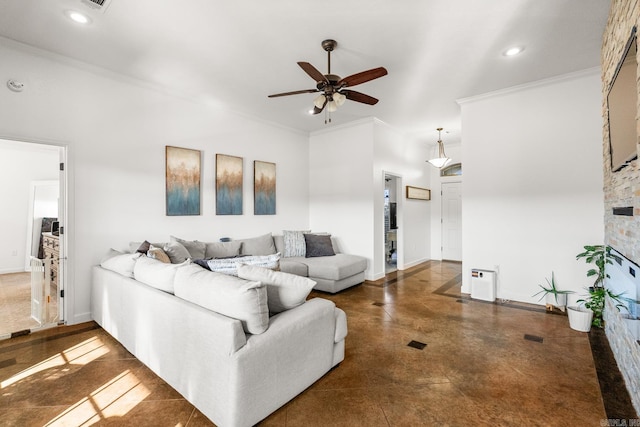 living room featuring ceiling fan and crown molding