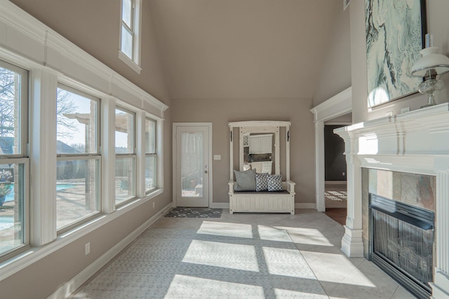 interior space featuring a fireplace and lofted ceiling