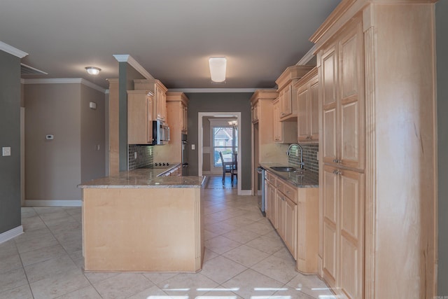 kitchen featuring backsplash, crown molding, sink, light brown cabinetry, and stainless steel appliances