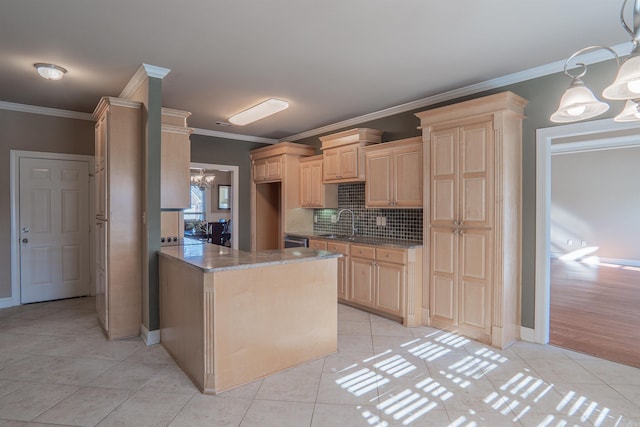 kitchen featuring light brown cabinetry, tasteful backsplash, crown molding, a chandelier, and light tile patterned flooring