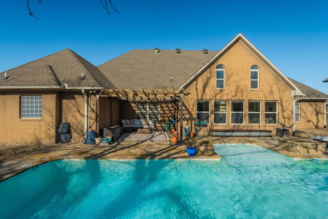 view of swimming pool featuring a pergola and a patio area