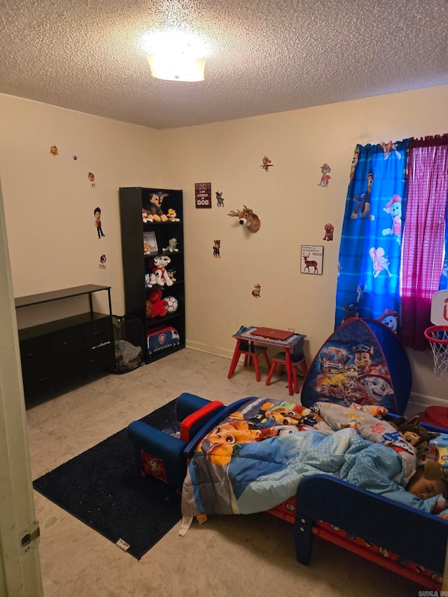 bedroom with a textured ceiling