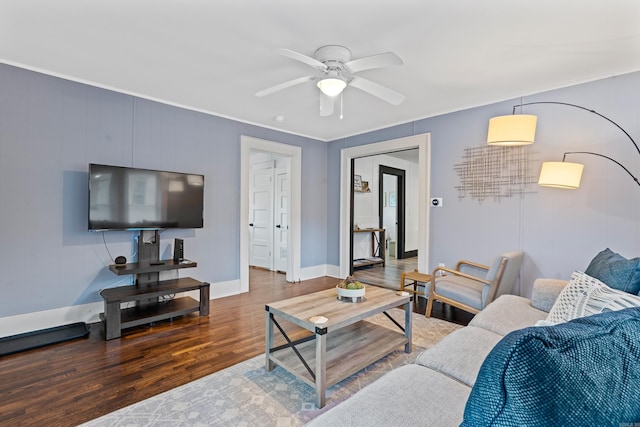 living room with ceiling fan and dark hardwood / wood-style flooring