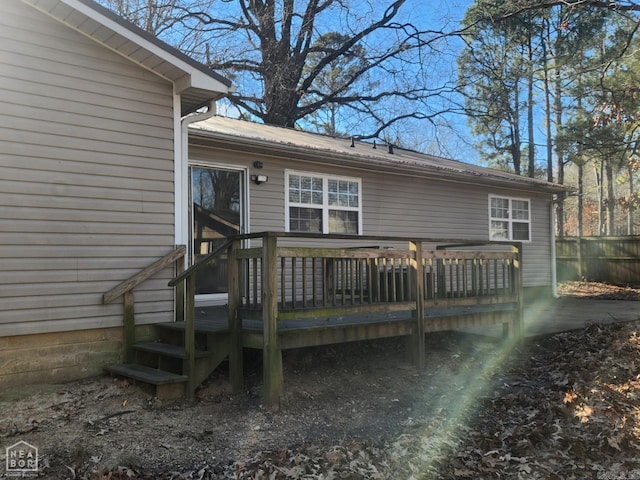 exterior space featuring a wooden deck