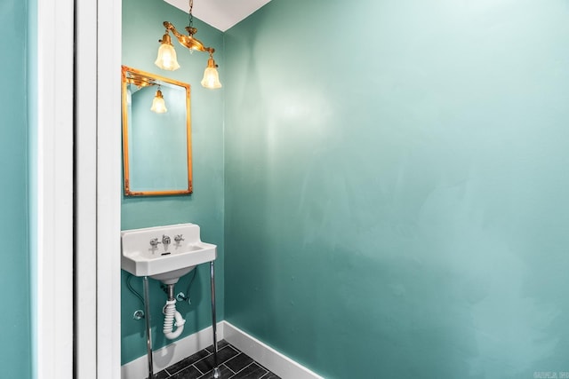 bathroom featuring tile patterned flooring and sink