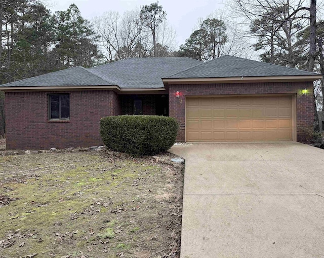 ranch-style home featuring a garage