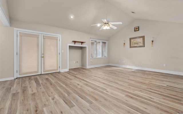 unfurnished bedroom featuring light hardwood / wood-style flooring, ceiling fan, and lofted ceiling