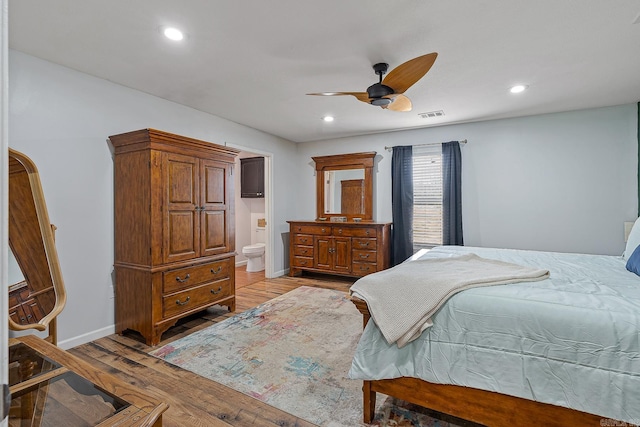 bedroom featuring light wood-type flooring, visible vents, baseboards, and recessed lighting