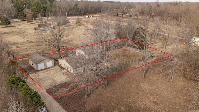 bird's eye view featuring a rural view and a view of trees