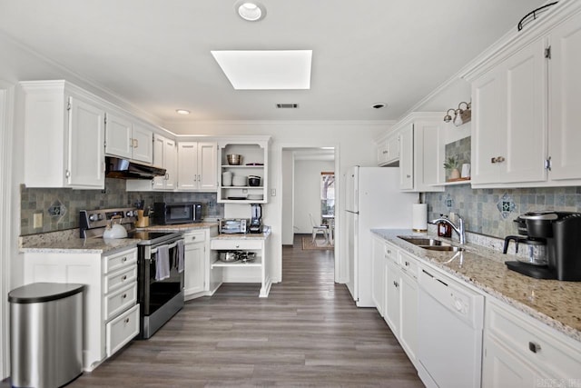 kitchen with white cabinets, white appliances, sink, and tasteful backsplash