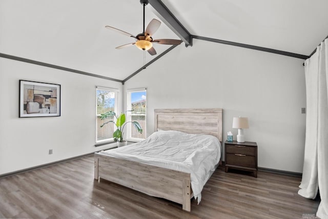 bedroom featuring vaulted ceiling with beams, ceiling fan, dark hardwood / wood-style flooring, and pool table