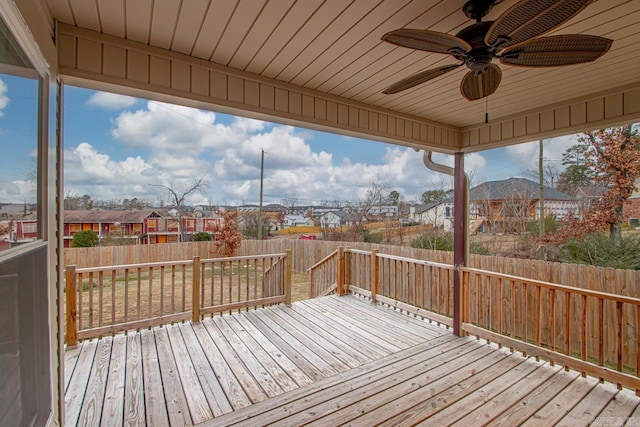 wooden terrace featuring ceiling fan