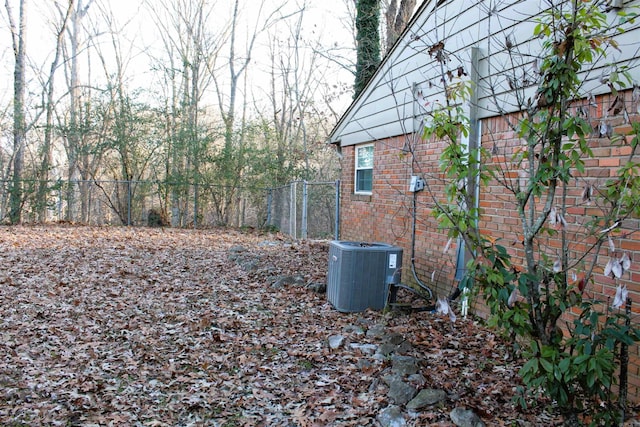 view of yard with central AC