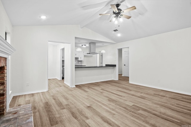 unfurnished living room featuring light wood-type flooring, lofted ceiling with beams, and ceiling fan