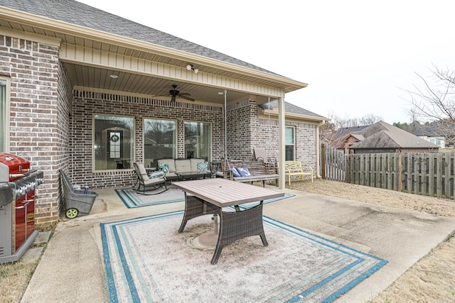 view of patio featuring outdoor lounge area and ceiling fan