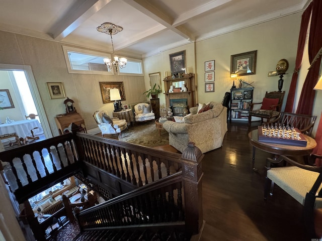 living room with coffered ceiling, a wealth of natural light, beamed ceiling, a notable chandelier, and dark hardwood / wood-style flooring