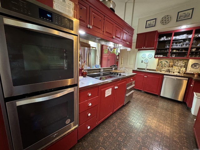 kitchen featuring stainless steel appliances and sink