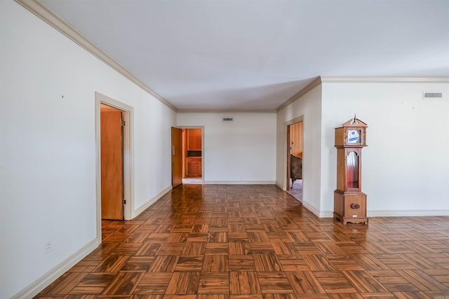 empty room featuring crown molding and dark parquet floors