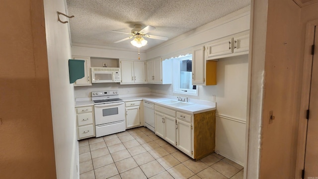 kitchen featuring white cabinetry, ceiling fan, sink, white appliances, and light tile patterned floors