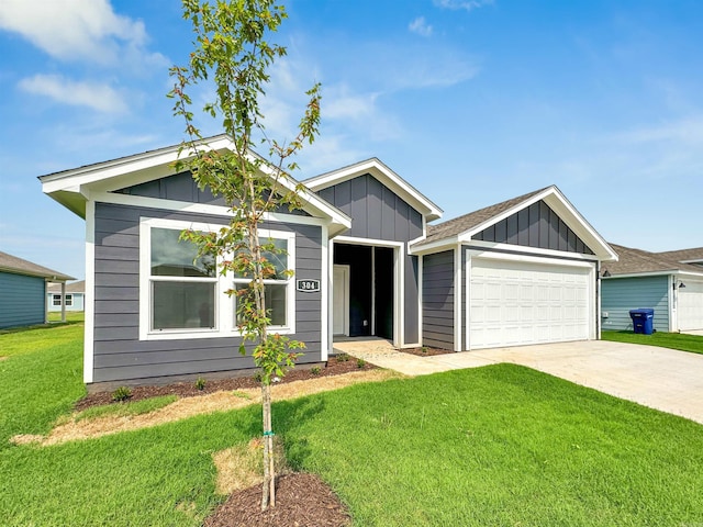 ranch-style house featuring a front yard, a garage, board and batten siding, and concrete driveway