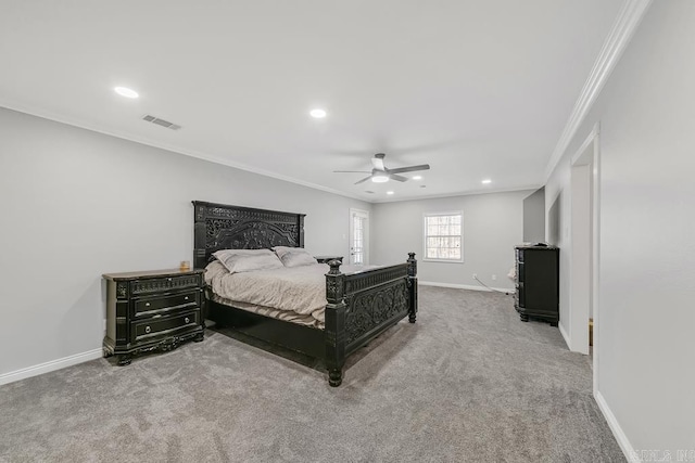 bedroom with ceiling fan, light carpet, and ornamental molding