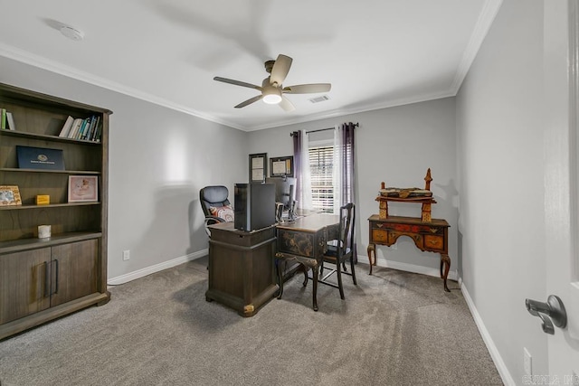 carpeted office with ceiling fan and ornamental molding