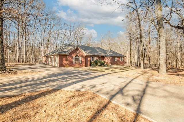 single story home featuring a garage