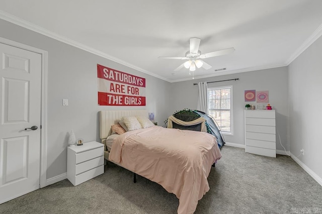 carpeted bedroom with ceiling fan and crown molding