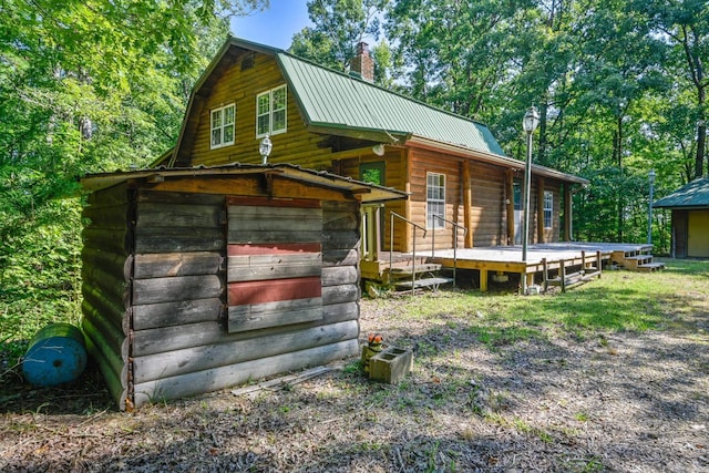 exterior space featuring a deck