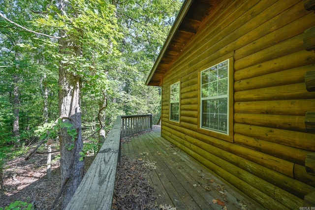 view of side of property with a deck