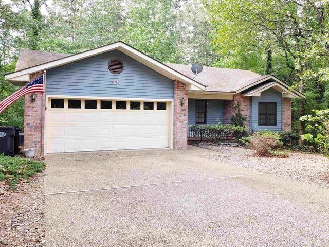 ranch-style home with a garage