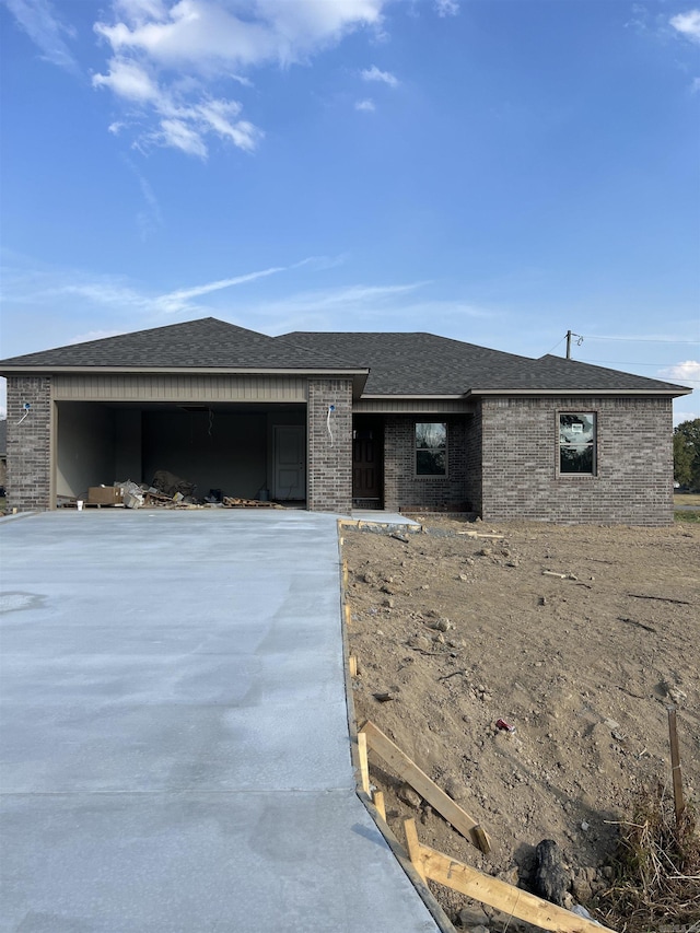 view of front of property with a garage