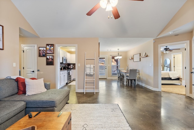 living room featuring ceiling fan with notable chandelier and lofted ceiling