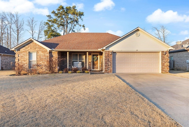 ranch-style home featuring a garage