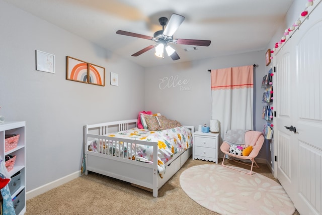 bedroom with ceiling fan and carpet