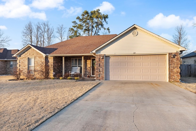 ranch-style home featuring a garage