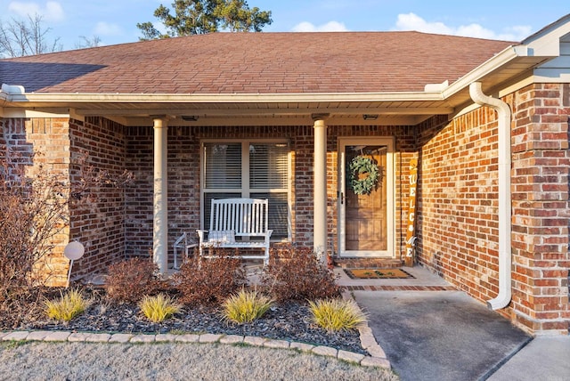 doorway to property with covered porch