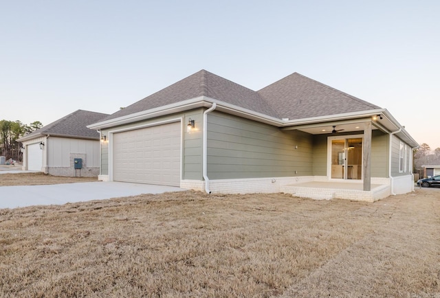 property exterior at dusk with a garage